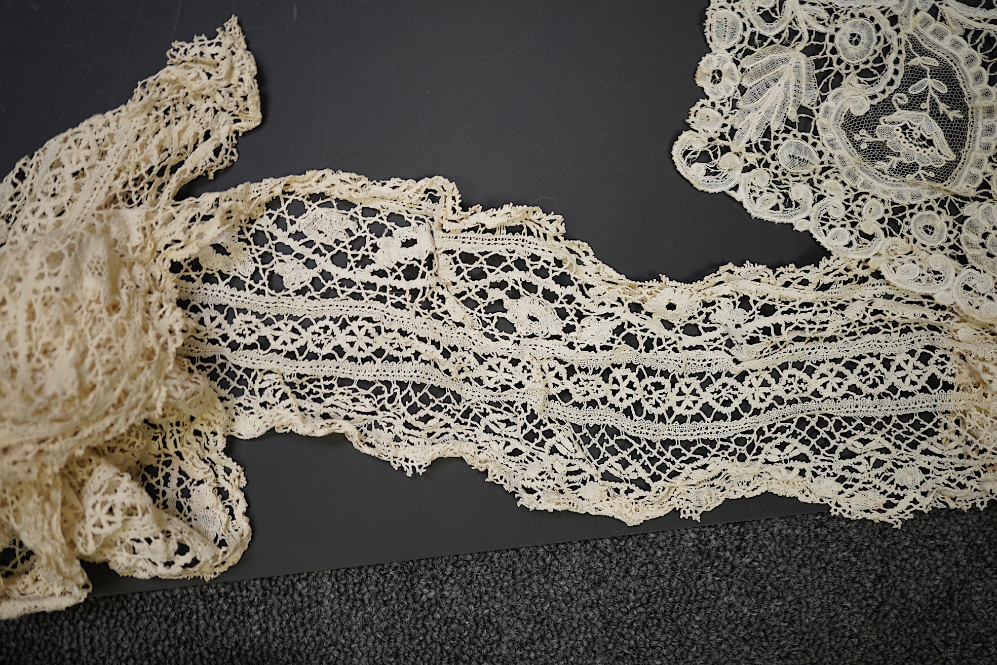 A mixed Brussels bobbin lace and Point de Gaze lace collar, another smaller collar, a similar length of trim and butterfly motif, together with a Brussels bobbin collar and trim, an Irish crochet cuffs, a Valenciennes la